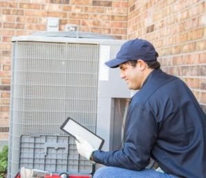 Man fixing ac system