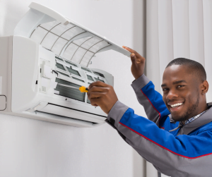 technician working on air conditioner