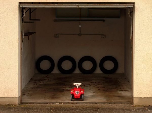 Image of garage with small toy car inside