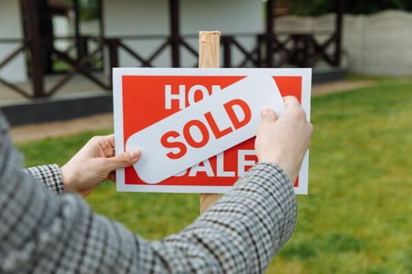 Buy homes for cash - house sold sign